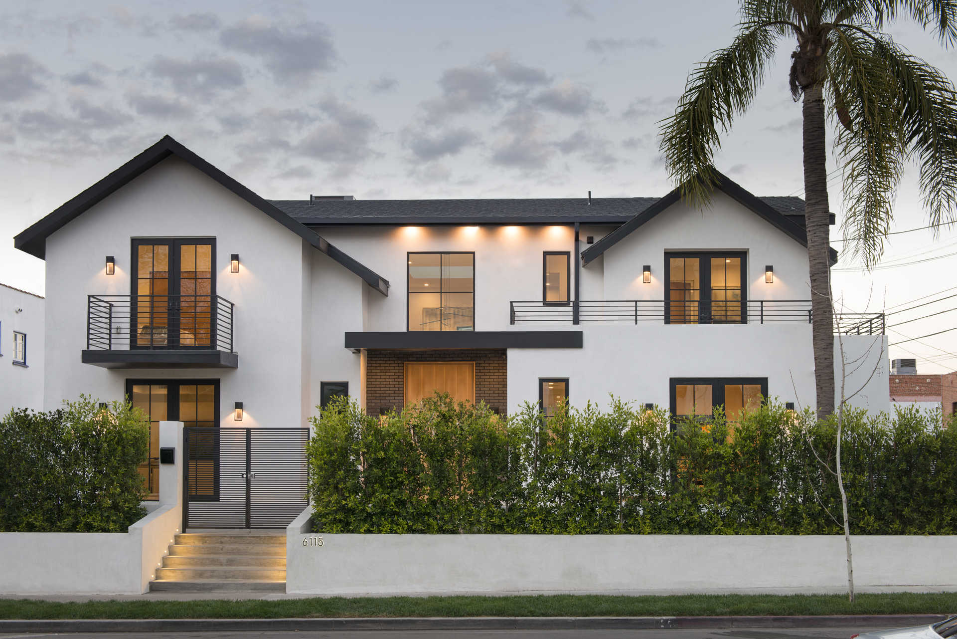 6th Street modern farmhouse residence — front exterior at dusk, Los Angeles