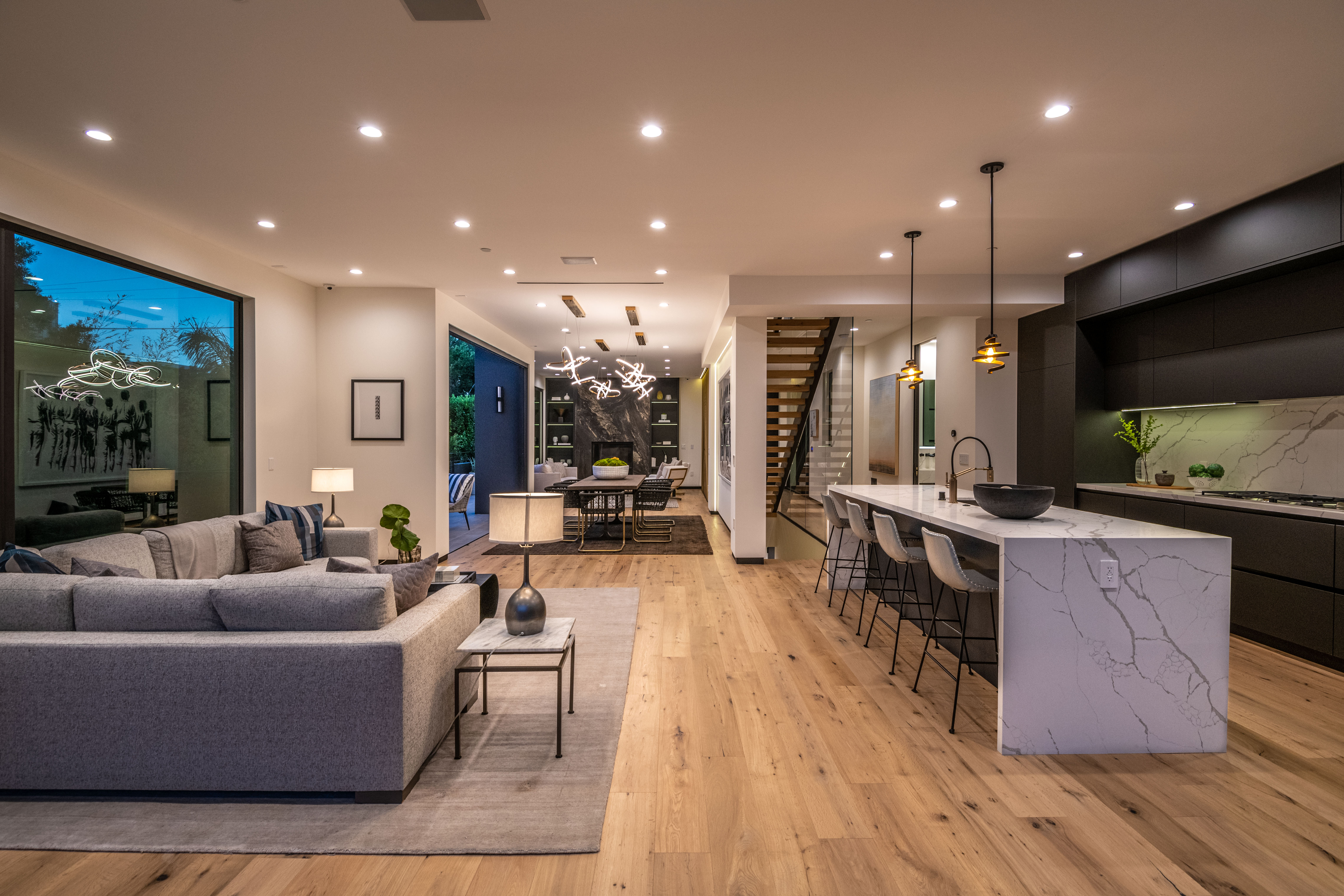 Dining room linked to patio via full-height sliding glass