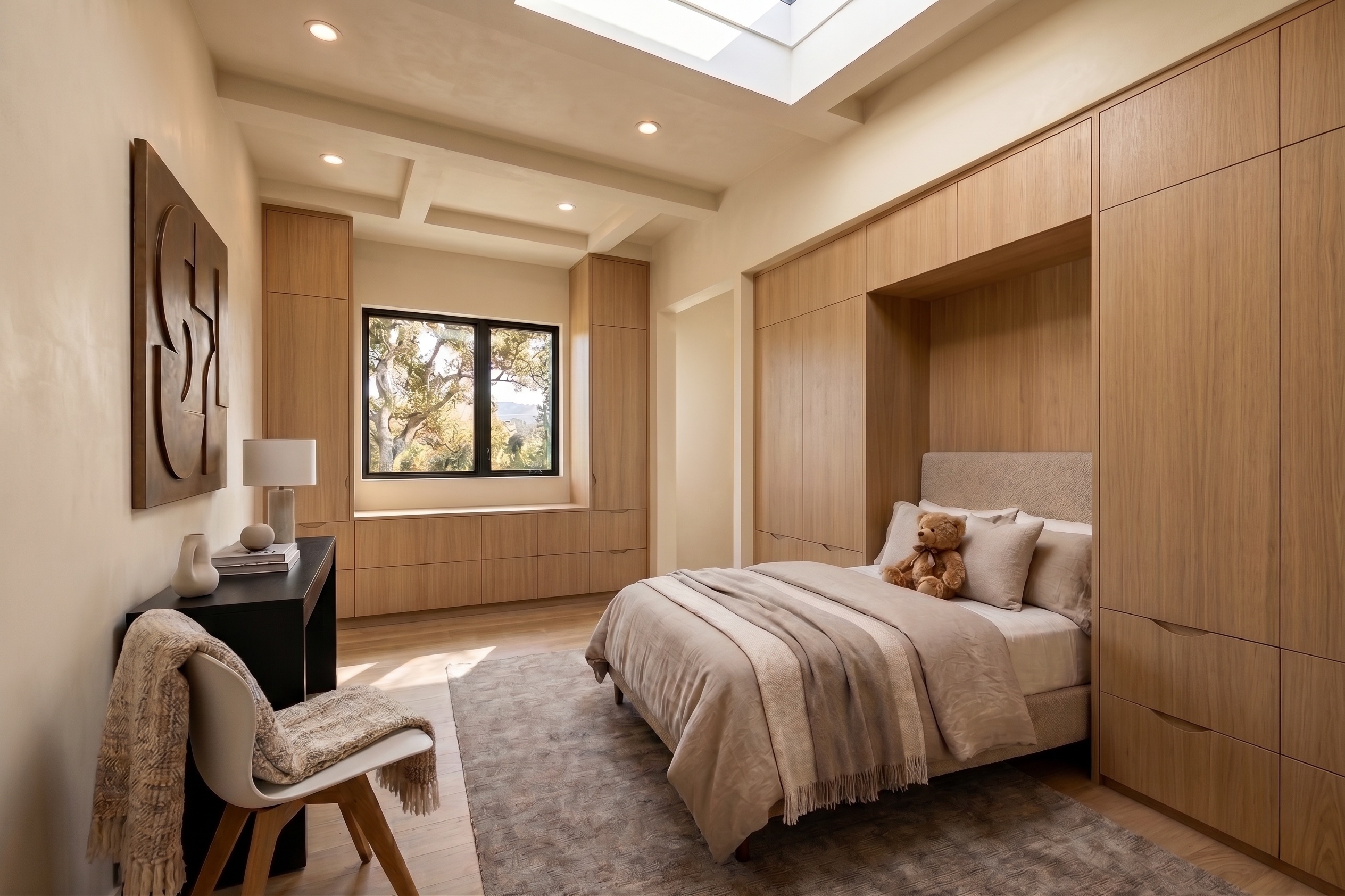 Secondary bedroom with wall of glazing