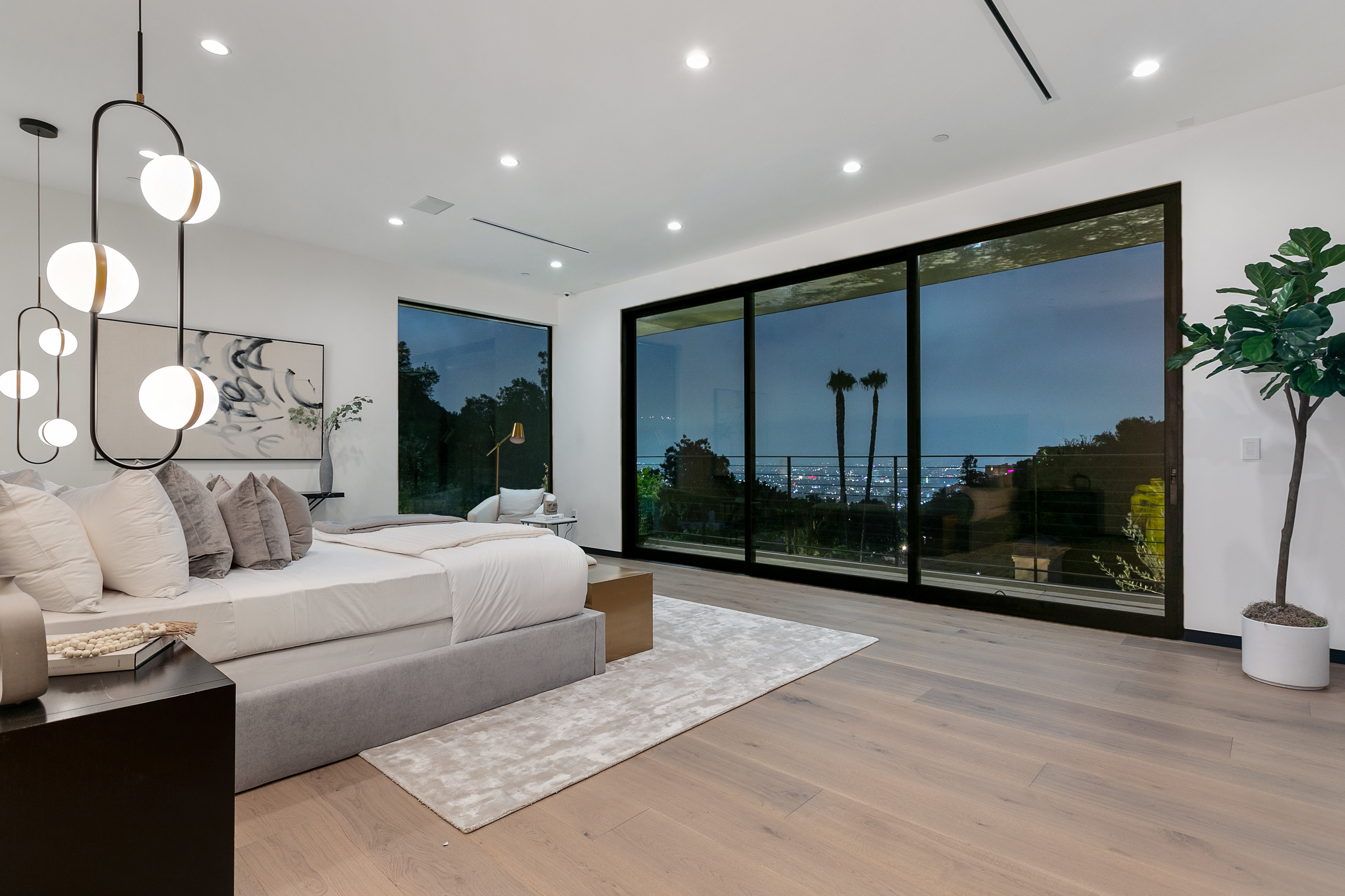 Primary bedroom with panoramic Los Angeles view