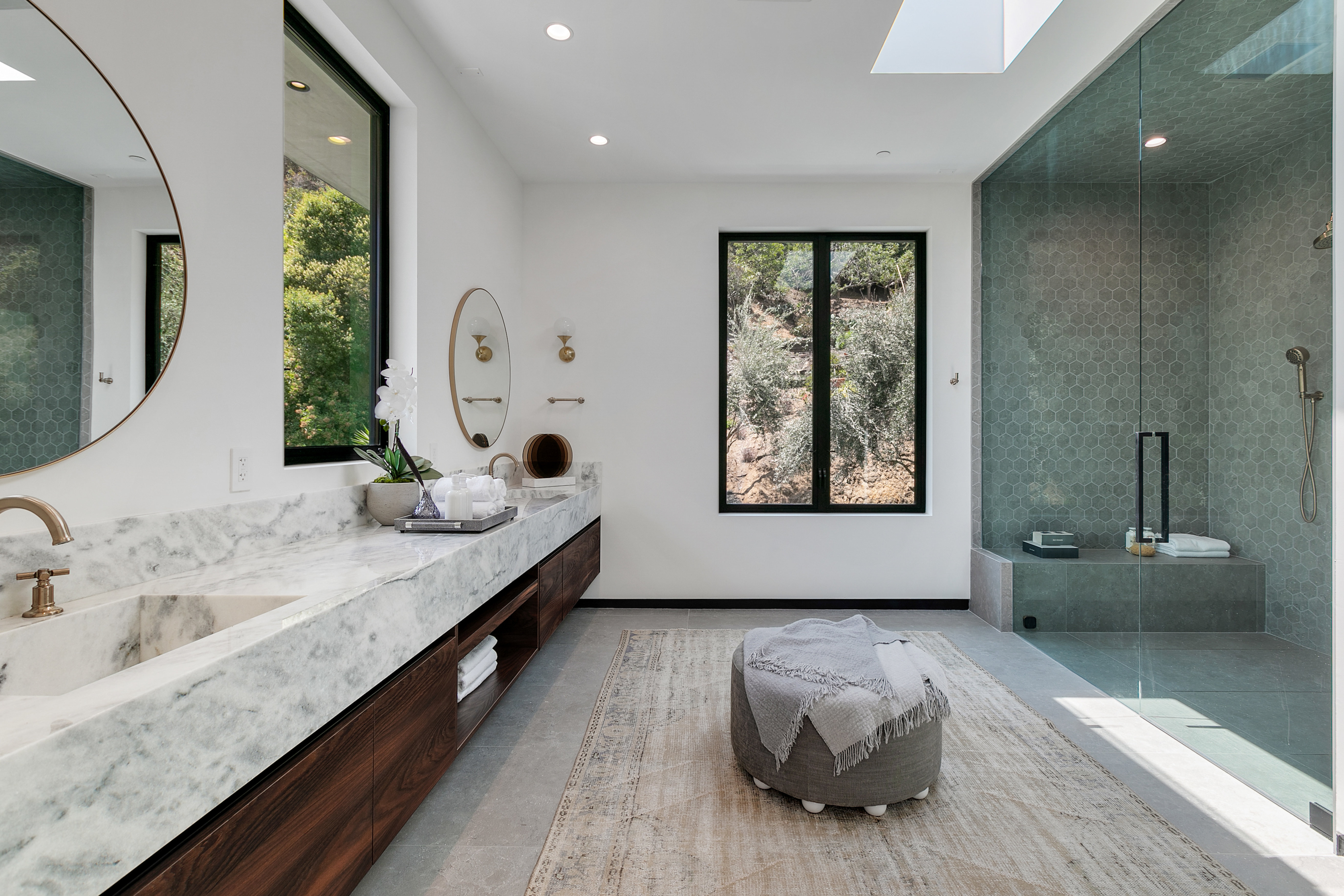 Primary bath finished in honed stone