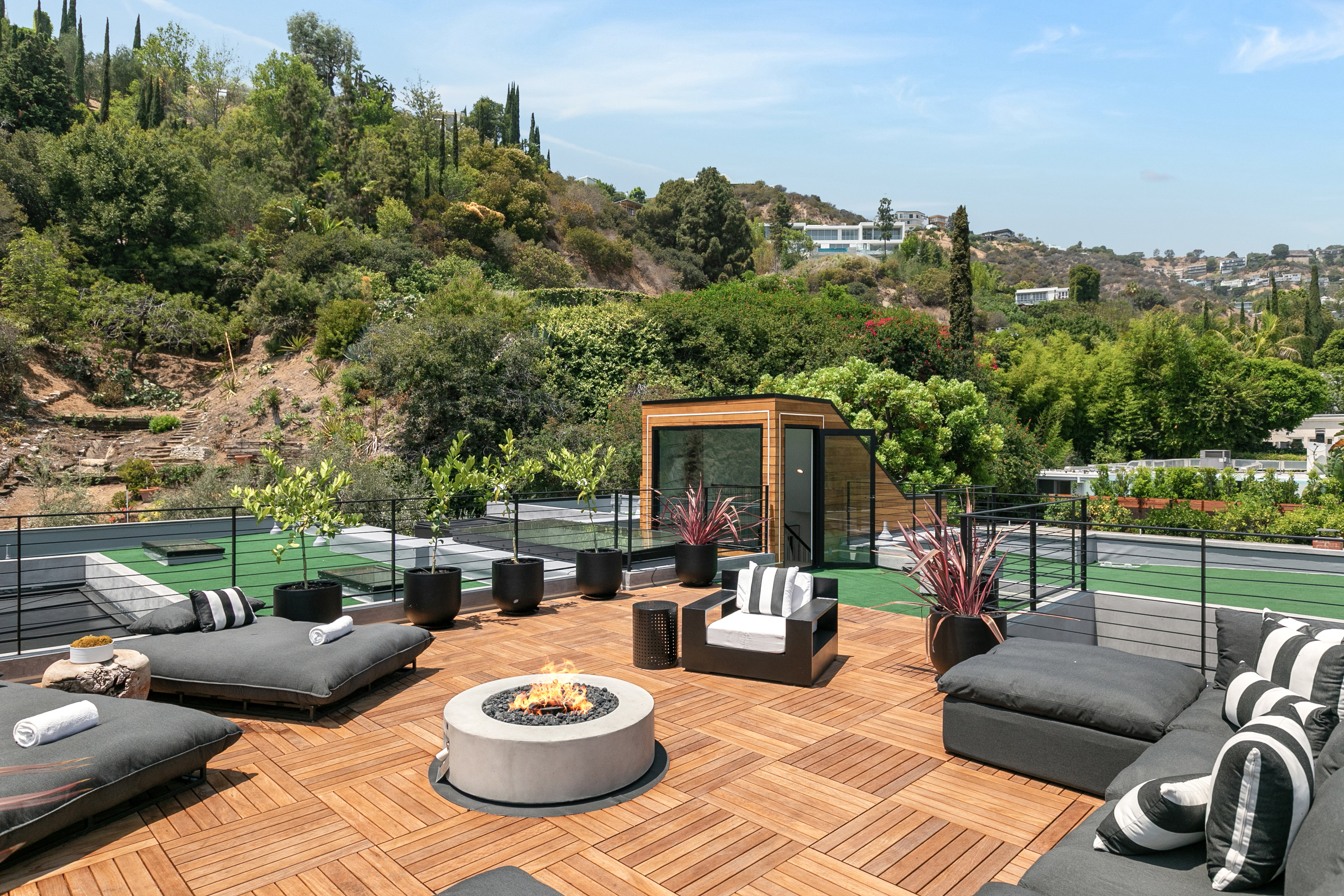 Rooftop putting green and fire feature