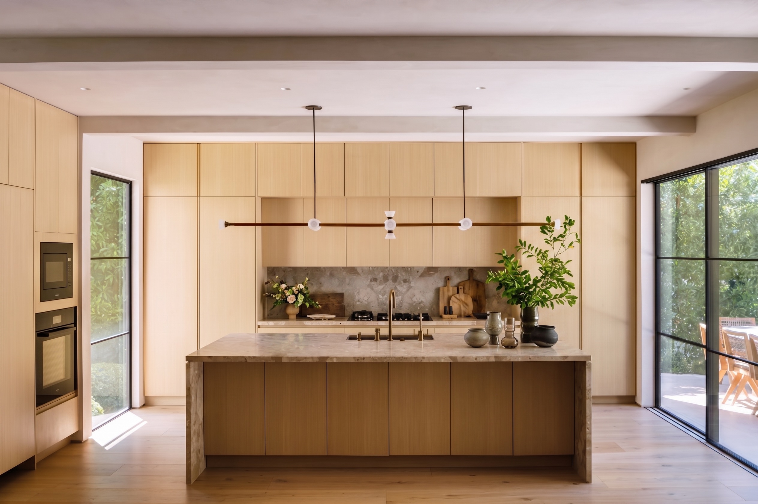 Contemporary kitchen with honed stone island