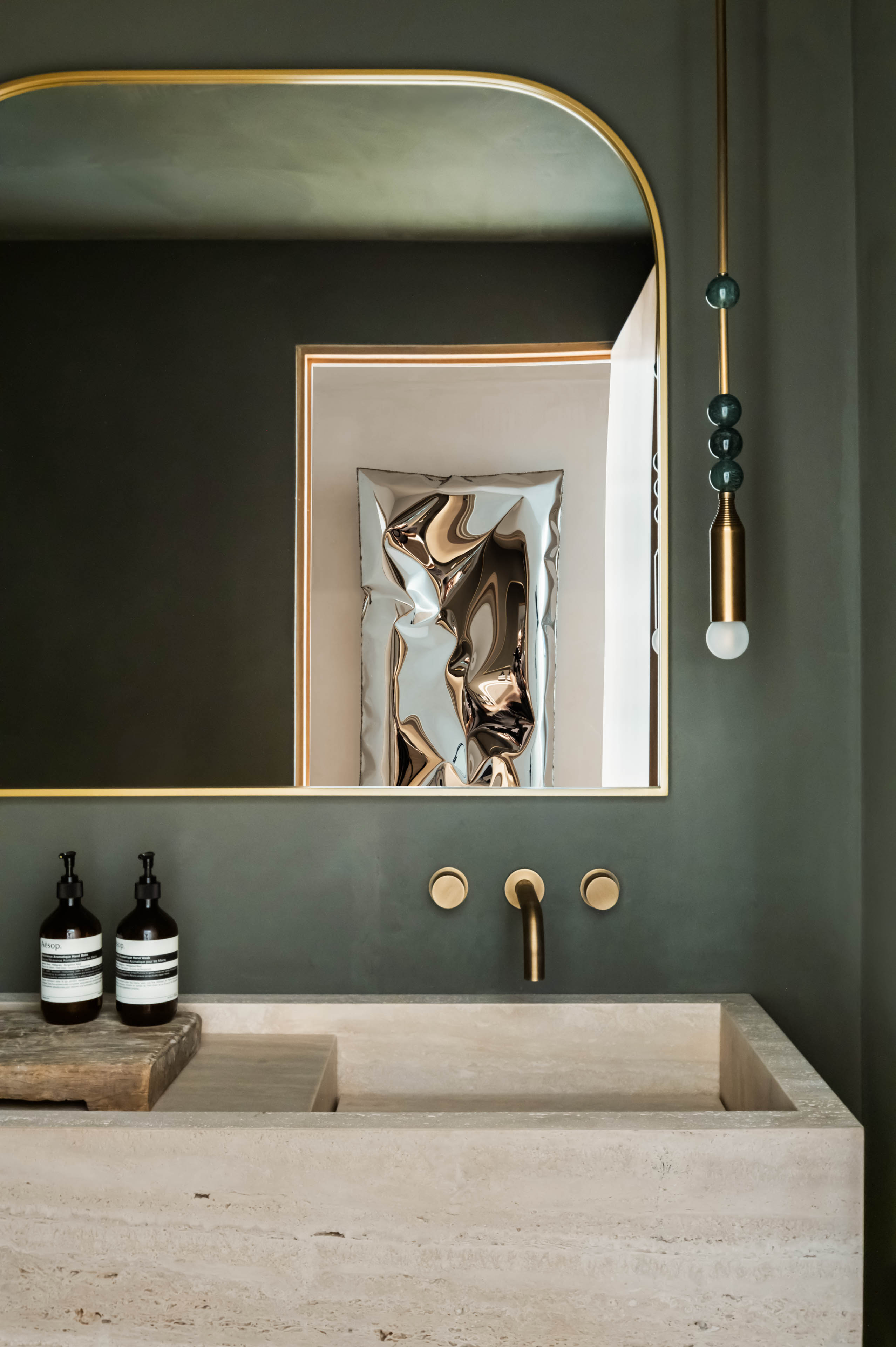 Powder room with custom vanity and stone detail